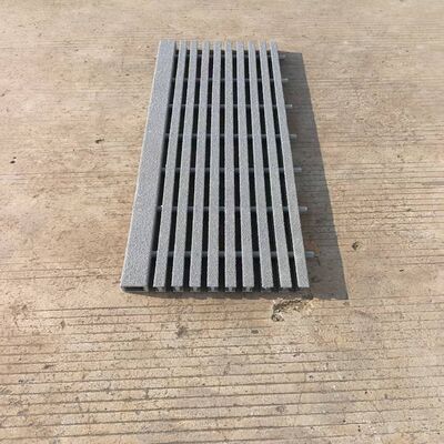FRP grating by pultrusion process with anti-slippery cover, could be served as sewer covers in the public facilities, as well as applied in chemical plant as corridor